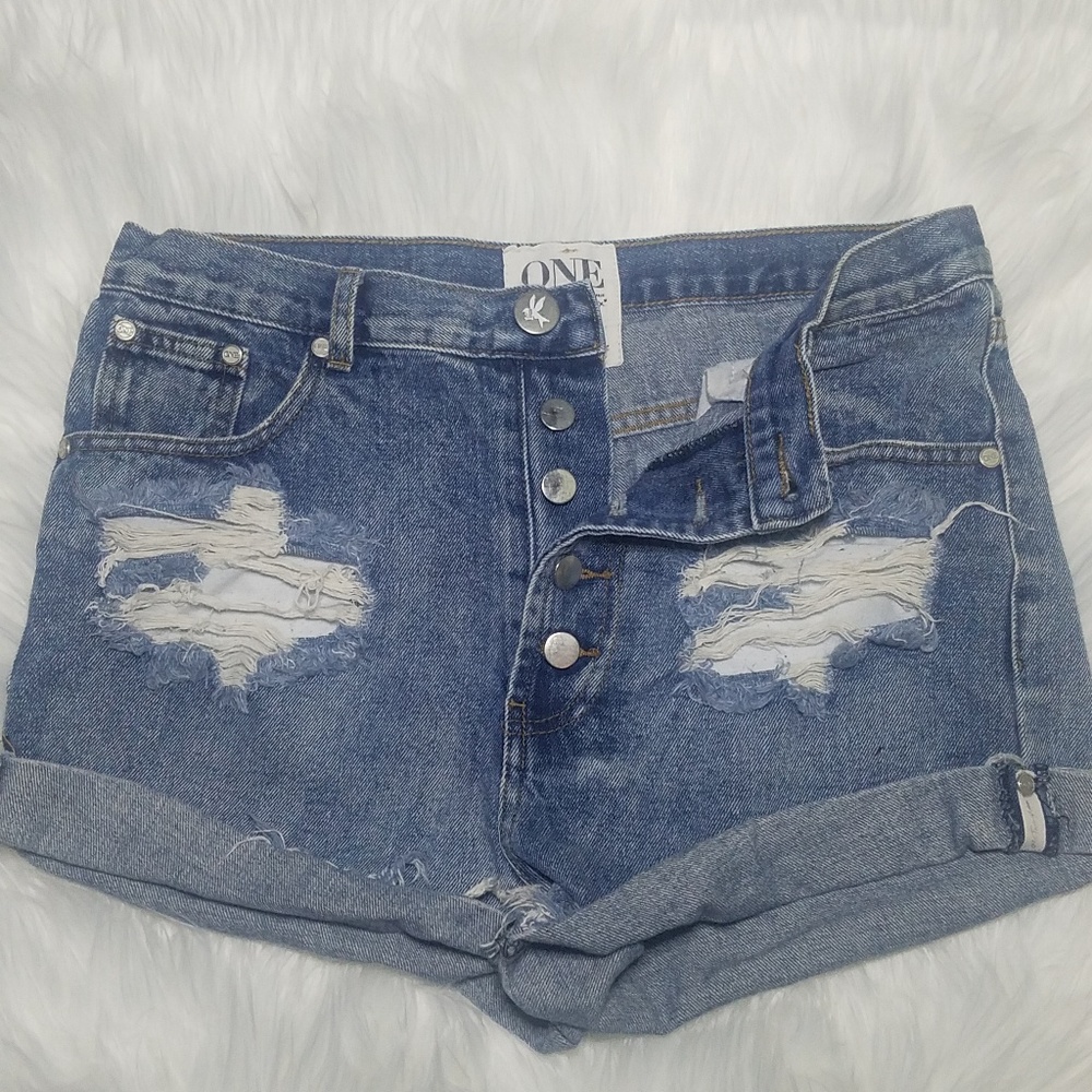 Distressed denim shorts